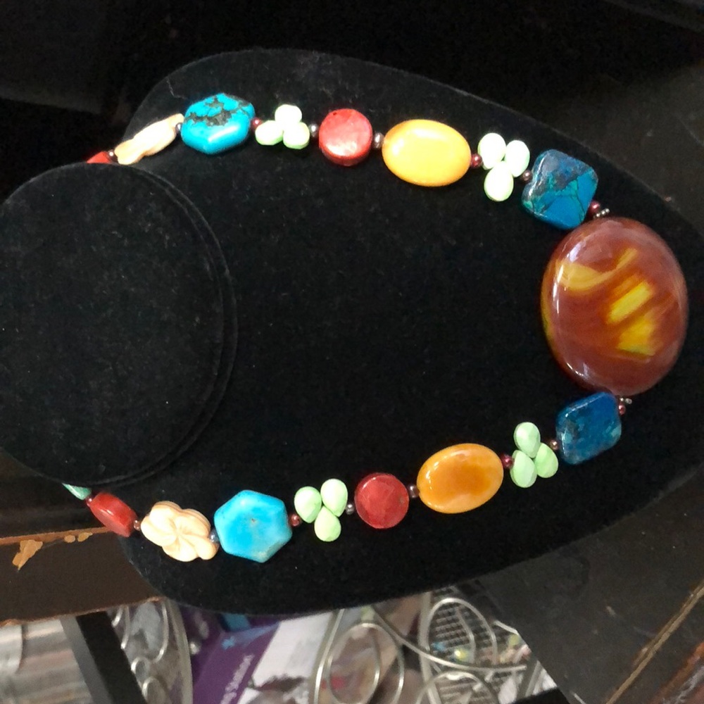 Genuine stone necklace.